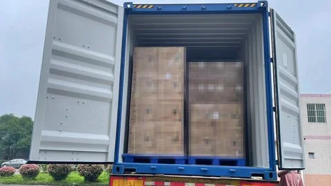 Loading containers for overseas shipment at CRSMT