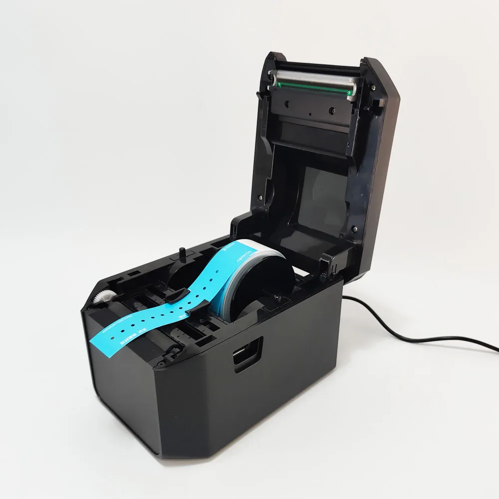 LabelPrint 300+ wristband printer with cover open showing paper path